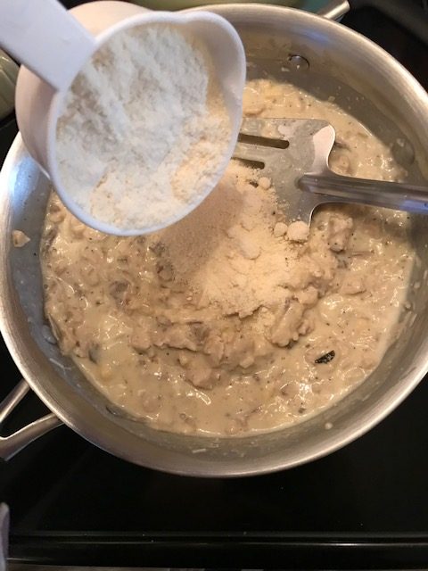 adding parmesan cheese to make chicken Alfredo
#heatherearles #herbnwisdom #chickenalfredo #dinnerideas #podcaster #healthyliving #blogger #author