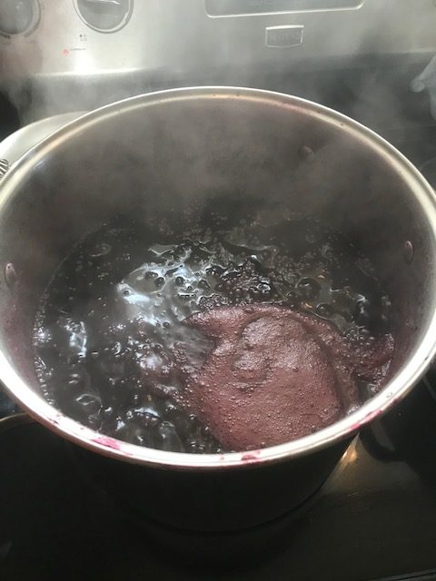 bringing the grape juice to a boil