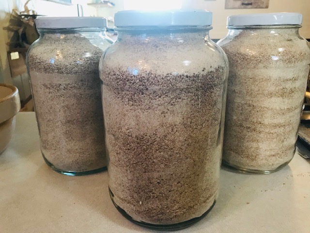 filled jars of wheat flour and Indian corn