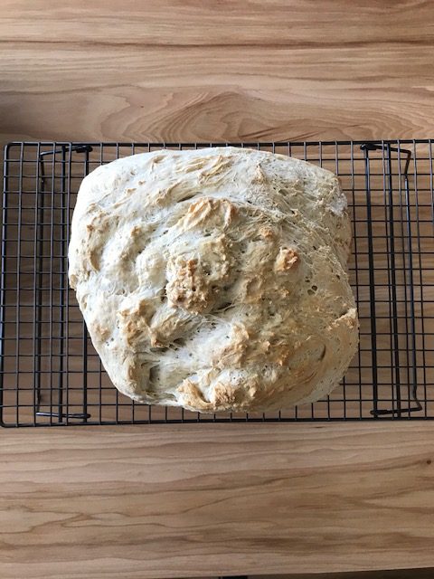 finished peasant bread on a rack