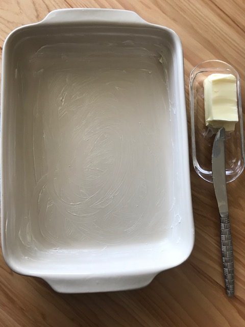 greasing a casserole dish