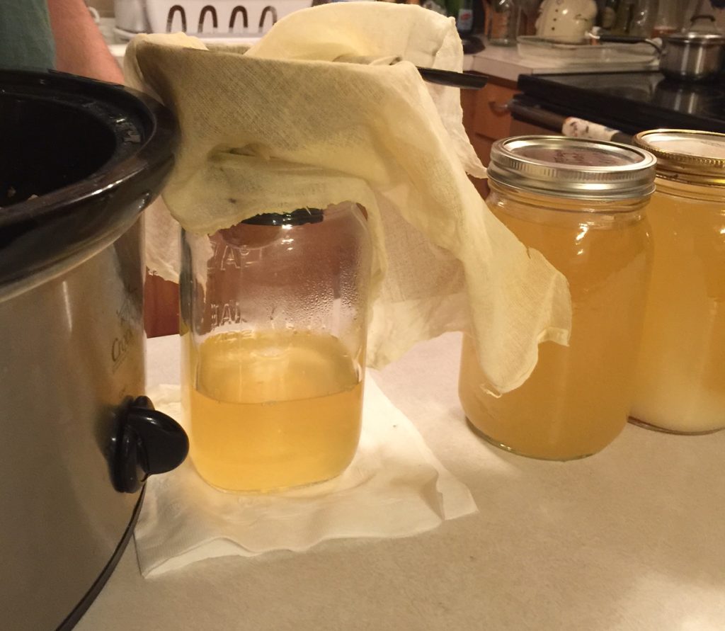 jar half filled with rendered down pig lard