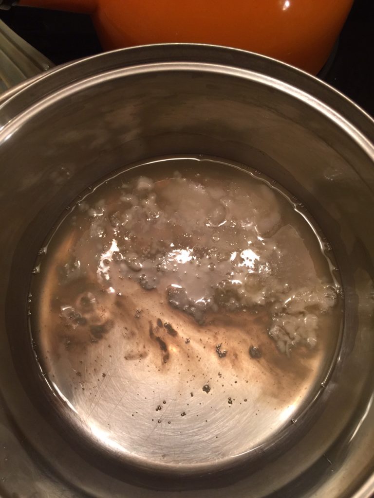 melting shea butter and coconut oil for body butter