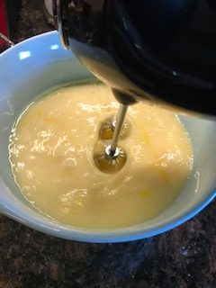 mixing the wet ingredients for waffles