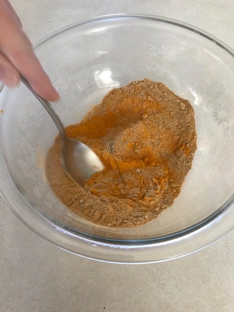 mixing turmeric, ginger and black pepper