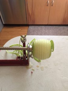 peeling an apple before dehydrating