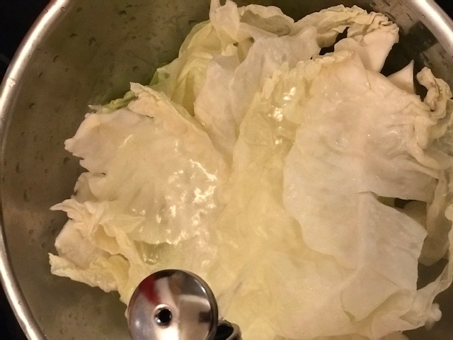 Pour boiling water  over cabbage leaves and set aside.
#HeatherEarles #cabbagerolls #cabbagerecipes