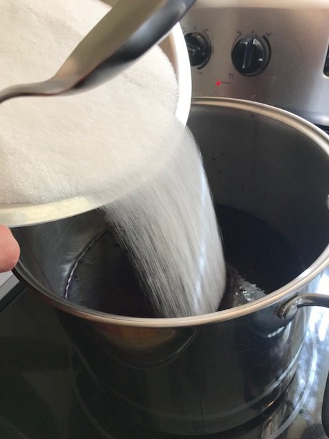 pouring the sugar