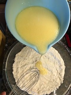 combining the wet and dry ingredients for waffles