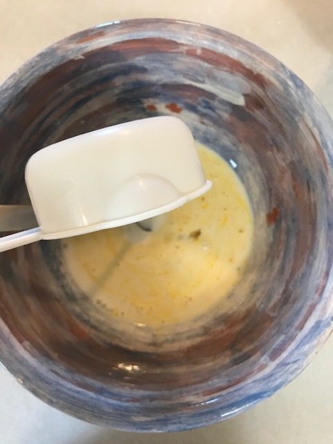 pouring the wet ingredients into a small bowl