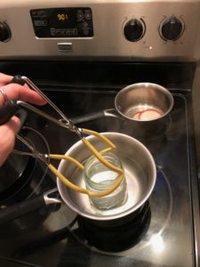 pulling jar from hot water