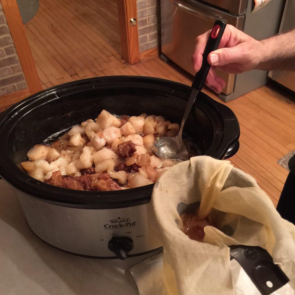 scooping lard out of the crockpot