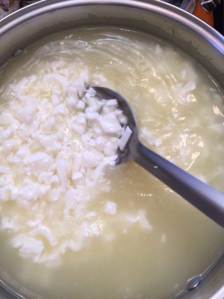 stirring the cheese curds