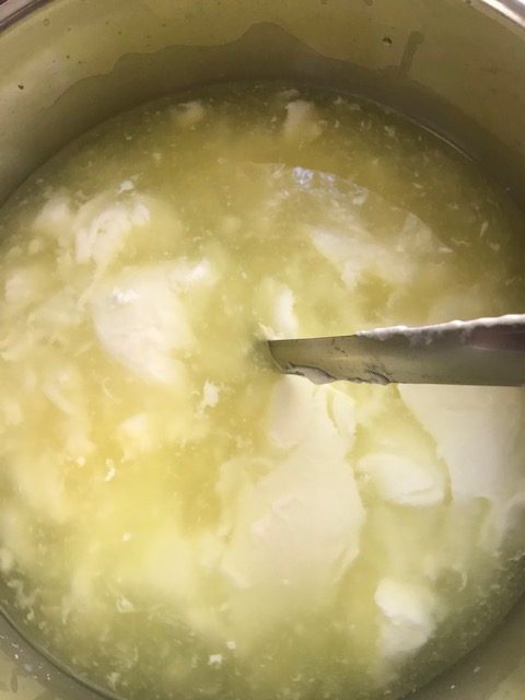stirring the curd