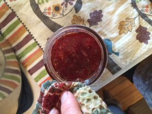 wiping the top of jar off